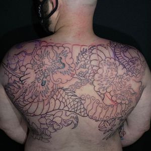 Start of 2 - 1/2 sleeves that continue into an upper back piece. Double dragons.