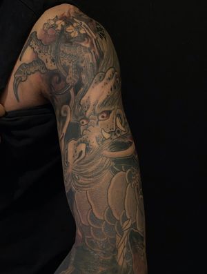 Dragon 3/4 sleeve that I worked into existing tattoos on my clients forearm