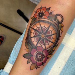 compass and flowers
