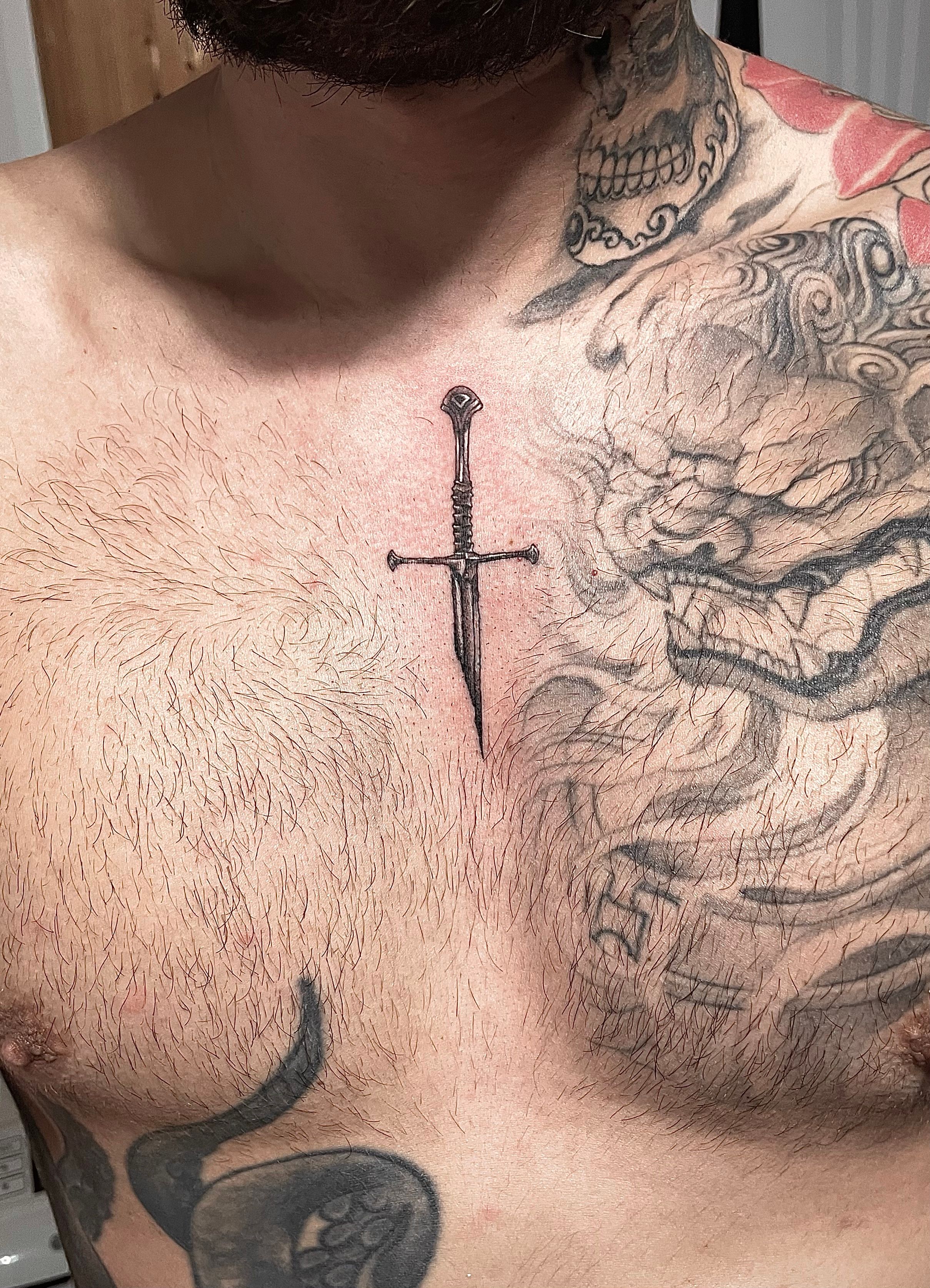 Tattoo uploaded by @nikomarkovich • Sternum sword • Tattoodo