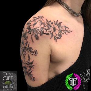 Floral shoulder piece. #tattoo #shouldertattoo #tattoosforwomen #flowertattoos #floraltattoos #sleeve #girlytattoos 