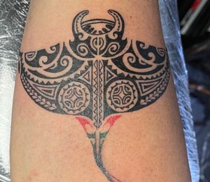 Polynesian style fish tattoo 