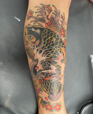 Koi fish tattoo- Coloured koi fish tattoo