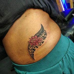 Lotus tattoo on hip