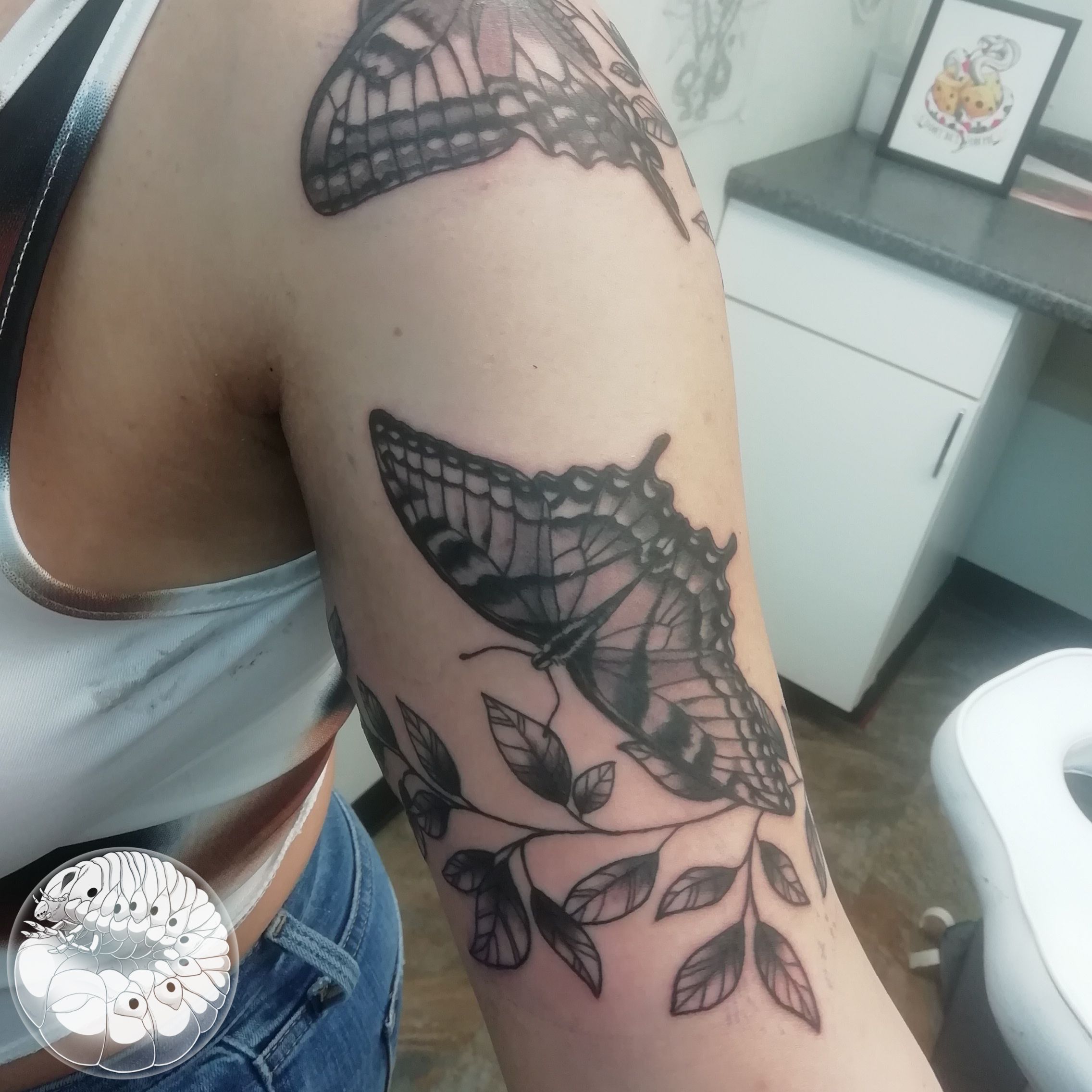 Wonderful Flower Vine With Butterfly Tattoo On Ankle By 2Face Tattoo
