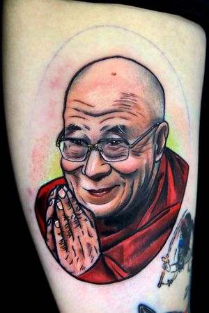 Dalai Lama portrait tattoo.