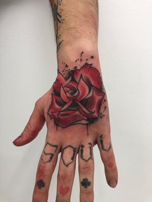 Neo traditional rose on hand with a littke bit of ink splatter