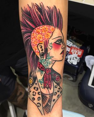 Traditional punk girl tattoo.
