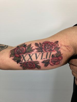 Neo traditional roses added as a border around existing roman numerals