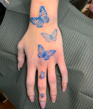 Butterflies on the hand and wrist