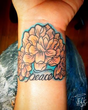 Custom floral peace tattoo
