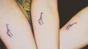 Sister tattoos giraffe life