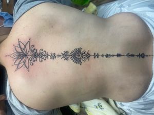 Full length spine tat by Devin