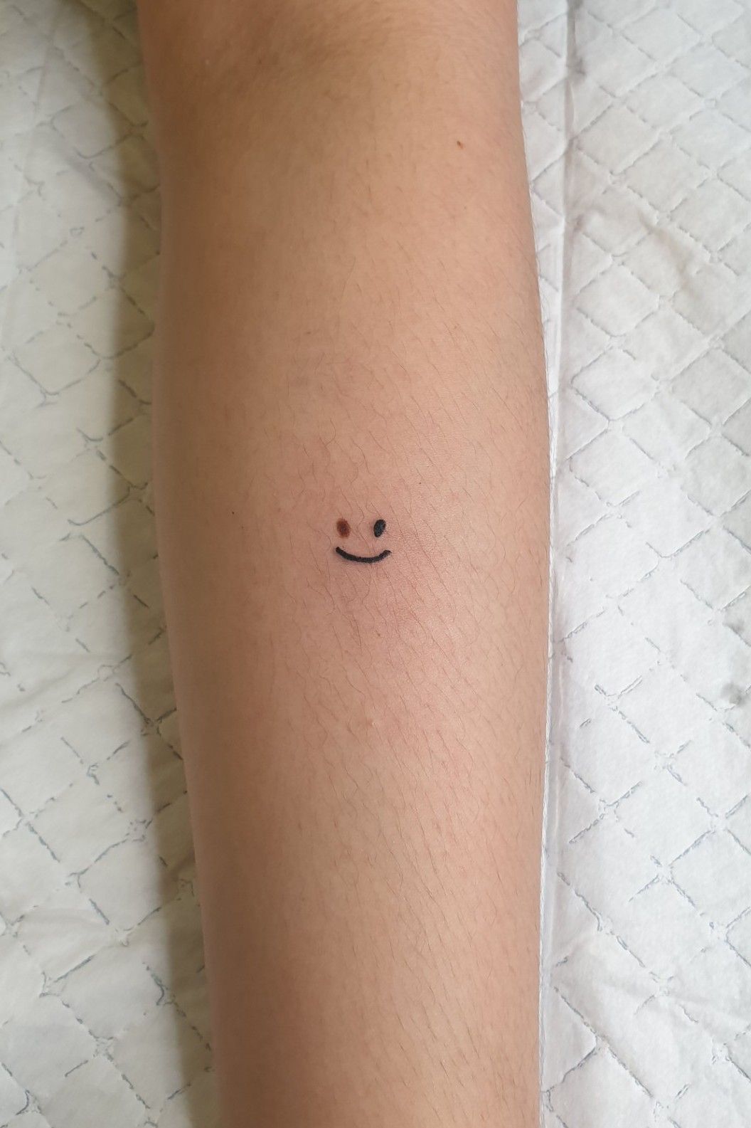 19 Cheerful Smiley Face Tattoo Designs  Moms Got the Stuff