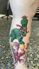Rex from Toy Story dressed as Woody (healed Sebastian) 