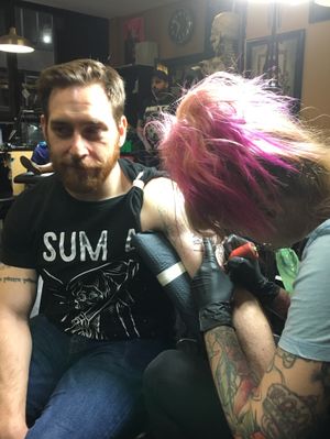 Getting a shoulder cover up piece by Myra Brodsky, who was visiting at Red Rocket tattoo shop in NYC