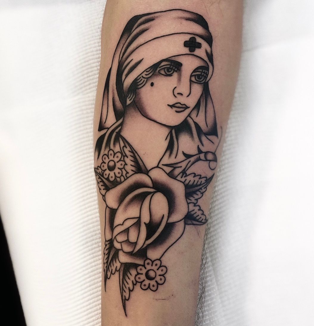 Neotraditional army nurse tattoo on the right inner