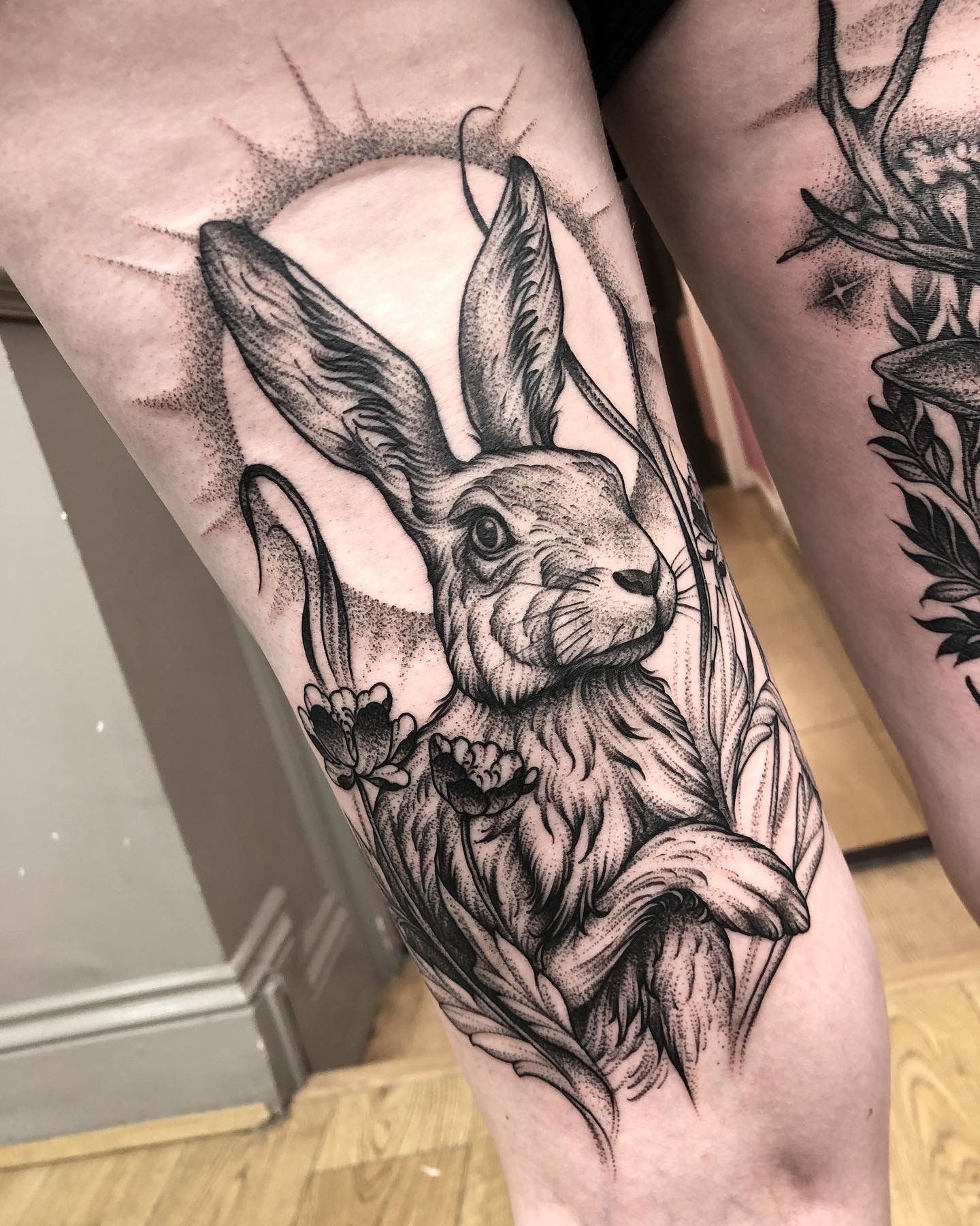Sketch work white rabbit tattoo done on the inner