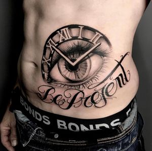 Be Present. Client's daughters iris in the centre of time with freehand script by Nick ⚜️ @nicksanna_tattoos