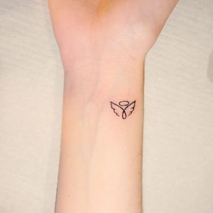 Minimal little angel and γ tattoo 