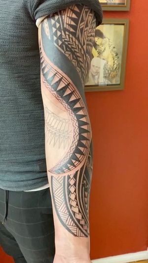 traditional blackwork sleeve in progress by our studio owner and artist Niki Ianiro 
