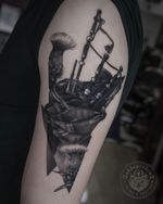 bagpipe tattoo done by Charlie Lame