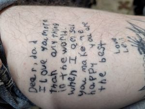 Letter from my son done right above the owl on inside left calf.