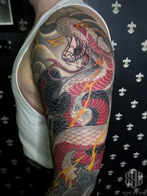New traditional double-snake full sleeve tattoo