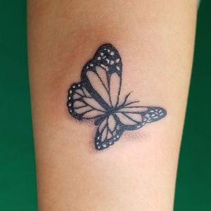 Minimalistic butterfly. My very first tattoo. Original design.