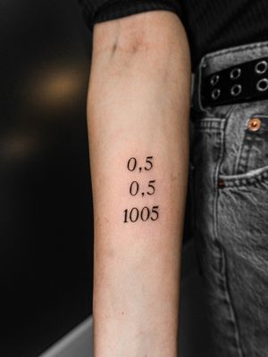 Small numeric tattoo