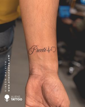 Checkout this Script Tattoo by Vinesh Malviya at Aliens Tattoo India.If you wish to get this tattoo visit our website - www.alienstattoo.com