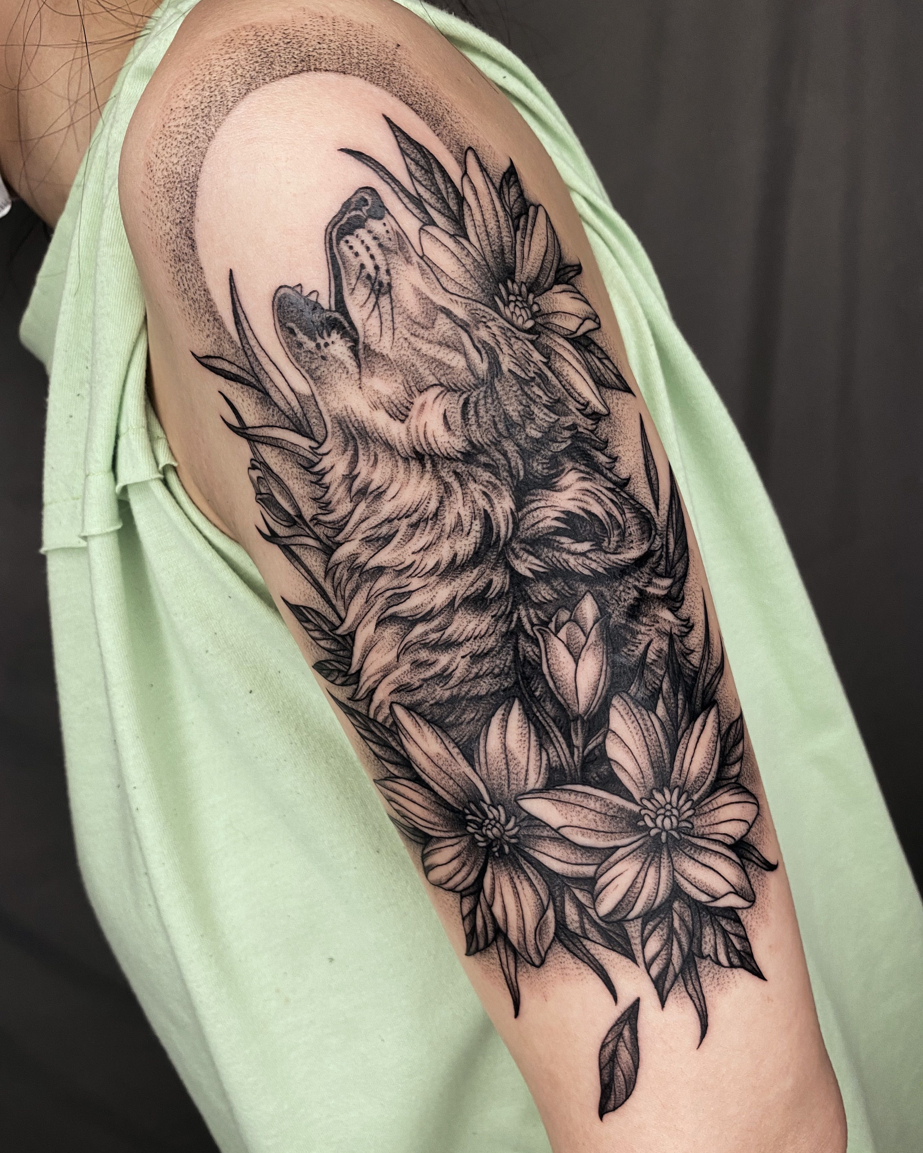 Angry wolf flower tattoo Anemones Black and grey Do not copy the design   Tattoos for women half sleeve Wolf tattoos for women Wolf tattoo