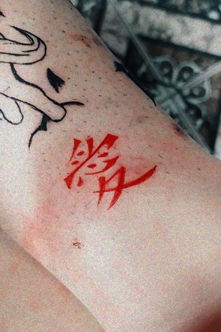 tattoo (kanji igual o do Gaara) Significa amor