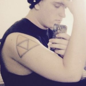 My first tattoo a Triforce from The Legend Of Zelda 