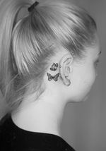 Butterflies behind ear