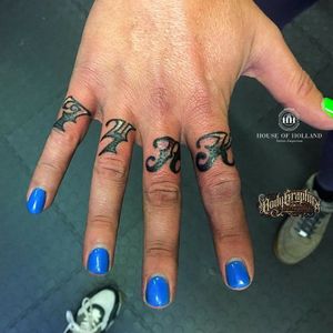 Some finger tattoos by Darren