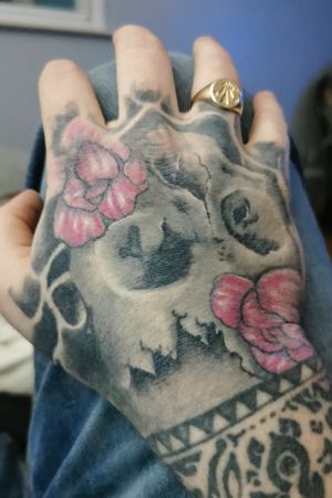 First hand Tattoo #skull #hand #flowers