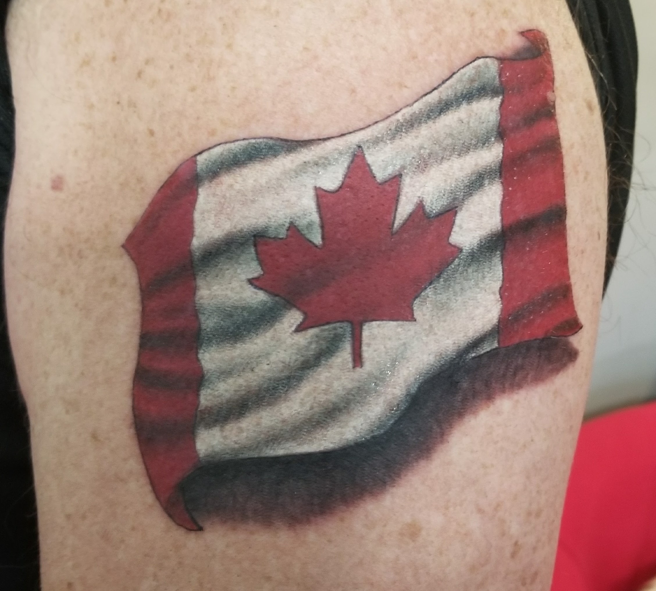 Canada flag with his kids  The Travelling Tattoo Artist  Facebook