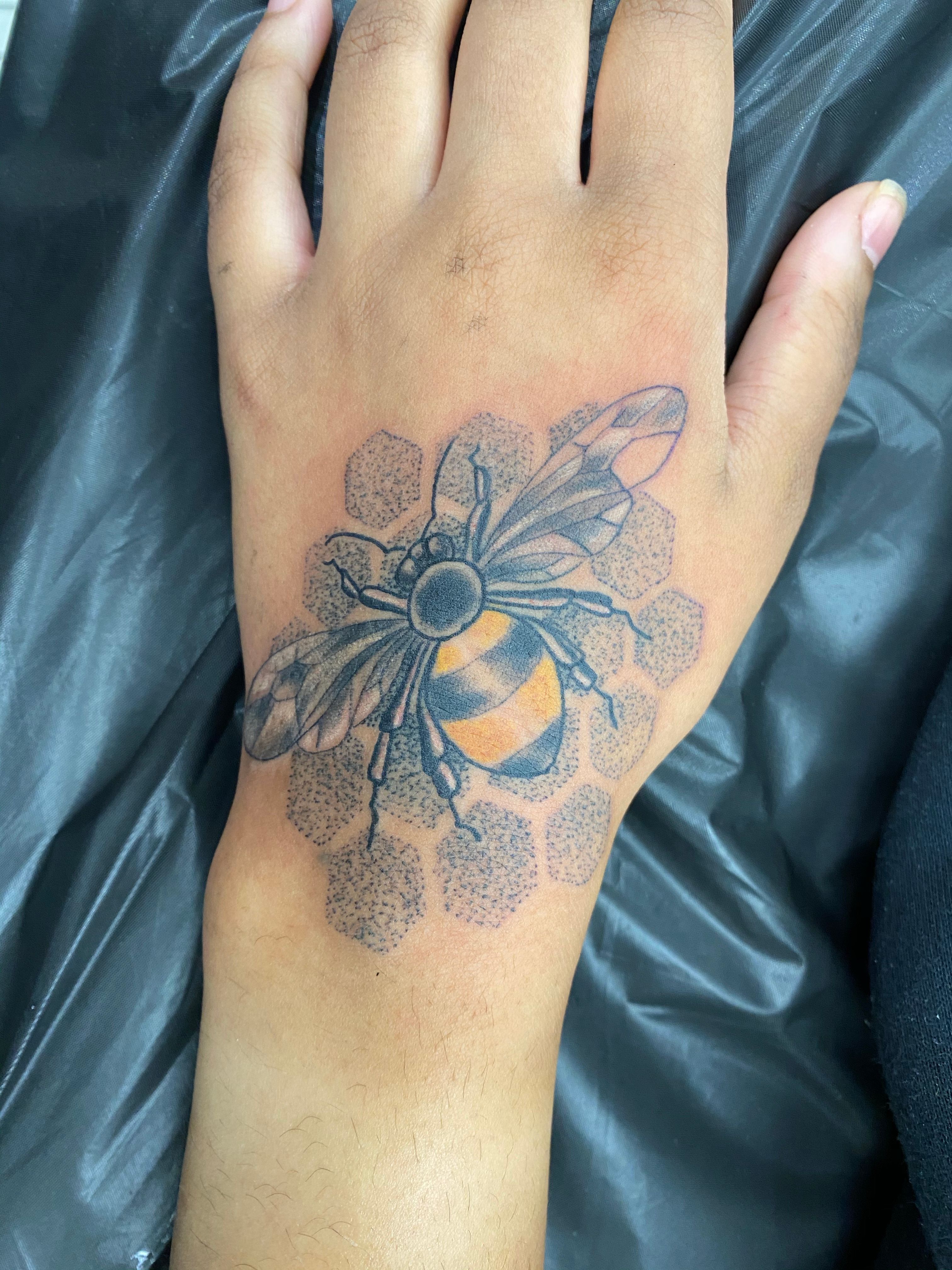 honey bee tattoo wrist