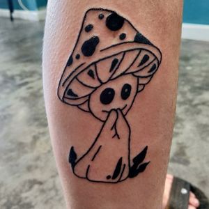 A cute mushroom blushing simple tattoo