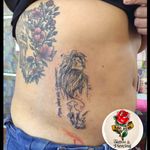 Lion King rib tattoo