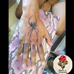 Spider hand tattoo