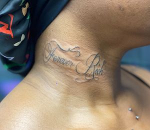 “Forever Rich” flourished script on the neck
