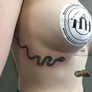 Awesome snake tattoo done by Siobhan