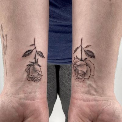 Matching roses. Done by Mario. #roses #matchingtattoos #nyc #wrists #black&grey