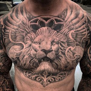 Chest piece lion skulls and wings 
