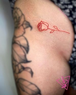 Hand-Poked Rose Fineline In Red Ink Tattoo by Pokeyhontas @ KTREW Tattoo - Birmingham, UK #rosetattoo #handpoked #stickandpoke #birminghamuk #thightattoo #handpoke 