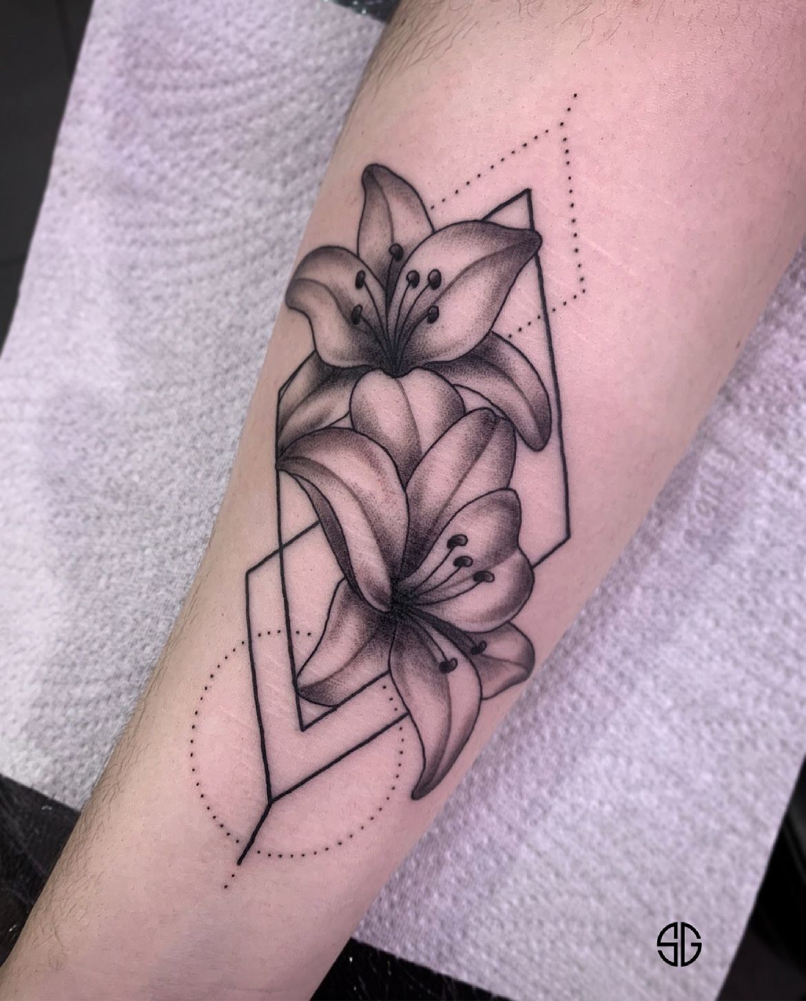 Tattoo uploaded by Southgate SG Tattoo  Piercing Studio   Lilies  self  harming scars cover up by our resident drivotattoo BooksInfo  southgatetattoo    lilies lily liliestattoo blackworktattoo  geometrytattoo 