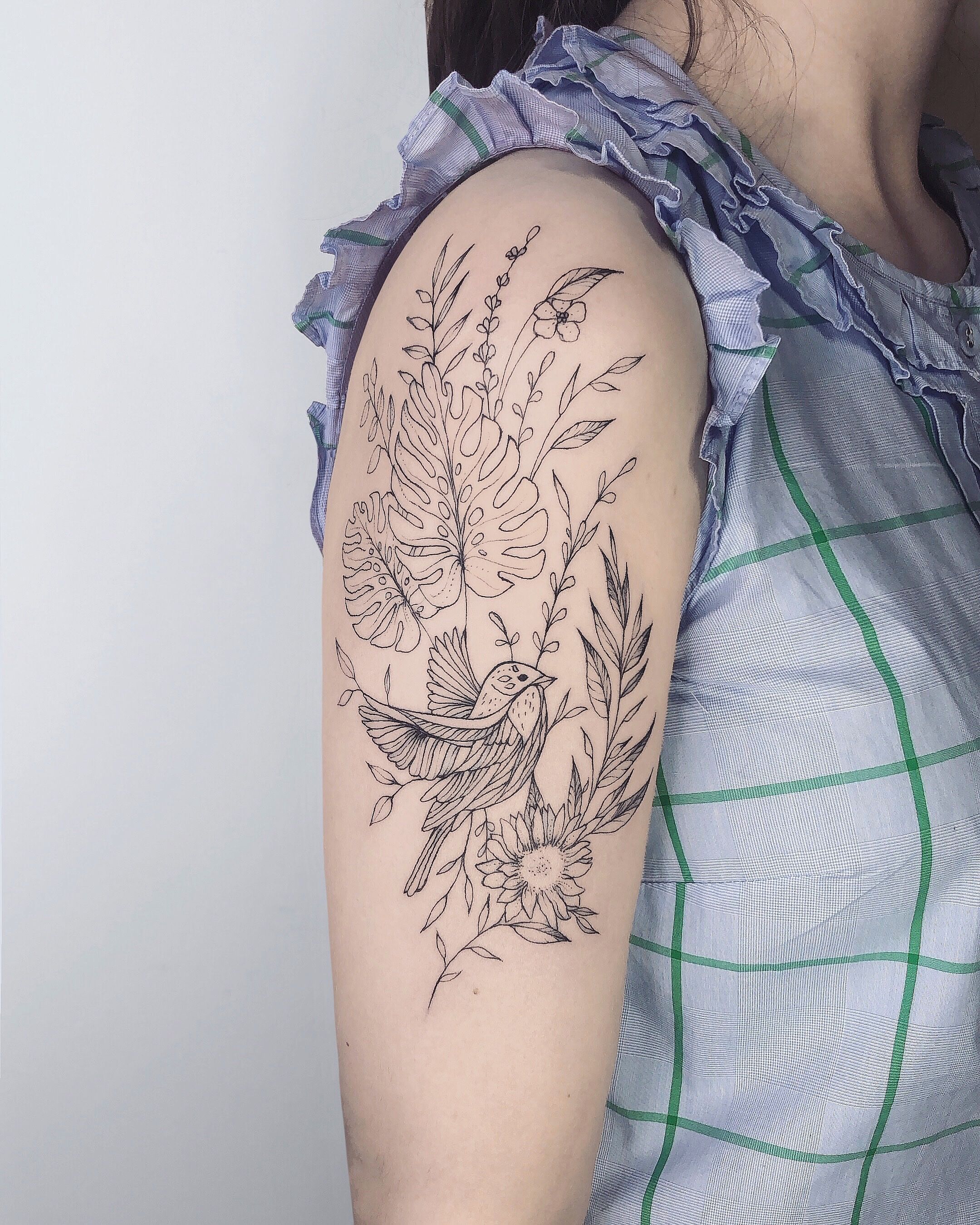 Tattoo uploaded by Tattoodo • Bird and flower tattoo by Diana Severinenko  #dianaseverinenko #birdtattoos #bird #feather #wing #poppy #flowers #floral  #nature #leaves • Tattoodo