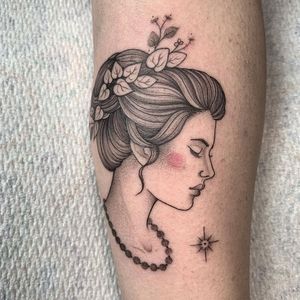 Get a beautiful and intricate fine line tattoo of a flower and woman on your forearm in London, GB.